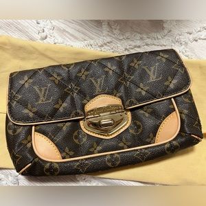 Authentic Louis Vuitton clutch vintage worn once very good condition